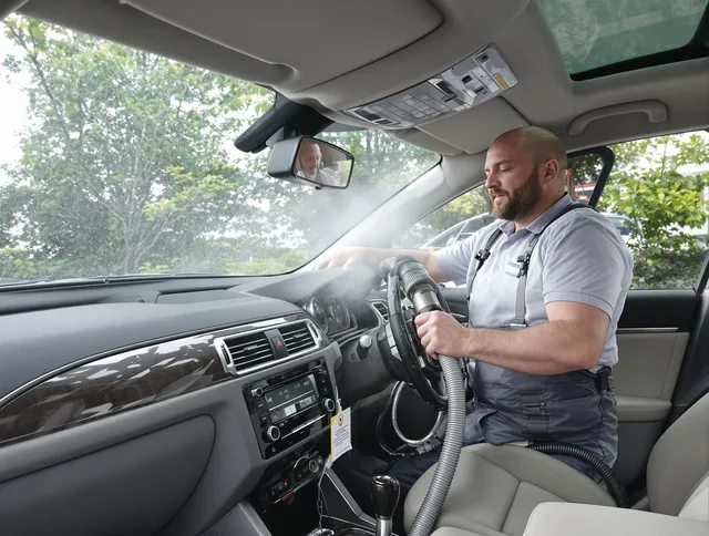 Warren Air Duct Cleaning specialist performing professional car duct cleaning in Warren